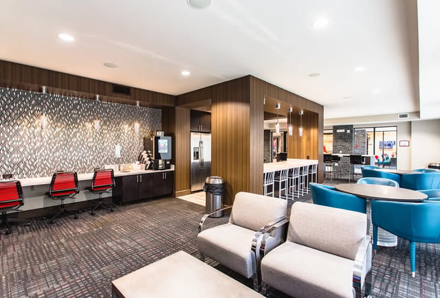 Coffee station, seating and bar area common space at Saga Tallahassee in Tallahassee Student Accommodation