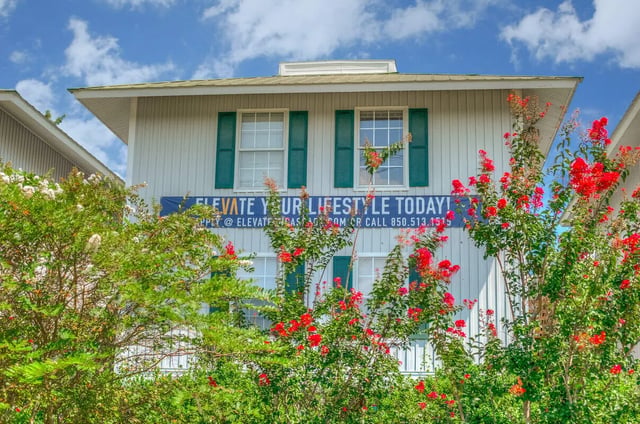 Two story house windows green shutters banner exterior at Elevate on Cascade in Tallahassee Student Accommodation