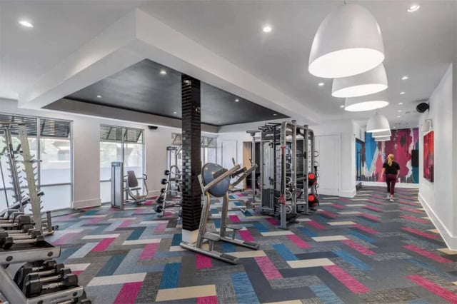 Dumbbells weight racks and exercise machines gym at Urban Enclave in Tallahassee Student Accommodation