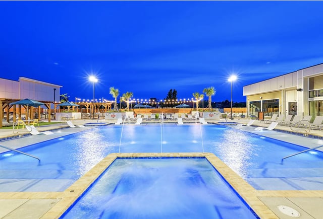 Pool with loungers and fountains exterior at The Metropolitan Tampa in Tampa Student Accommodation