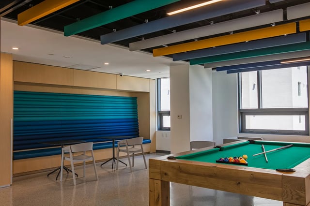 Pool table and seating area playing area at The One at University City in Miami Student Accommodation