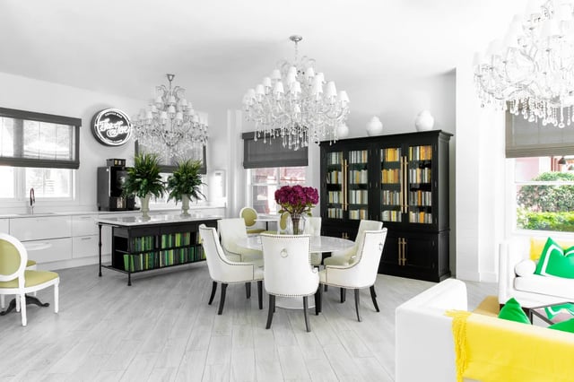 Dining and kitchen area with white furniture at The Social Tampa in Lutz Student Accommodation