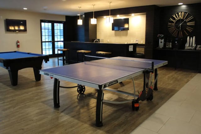 Ping pong table and pool table common area at The Flats at 4200 in Tampa Student Accommodation