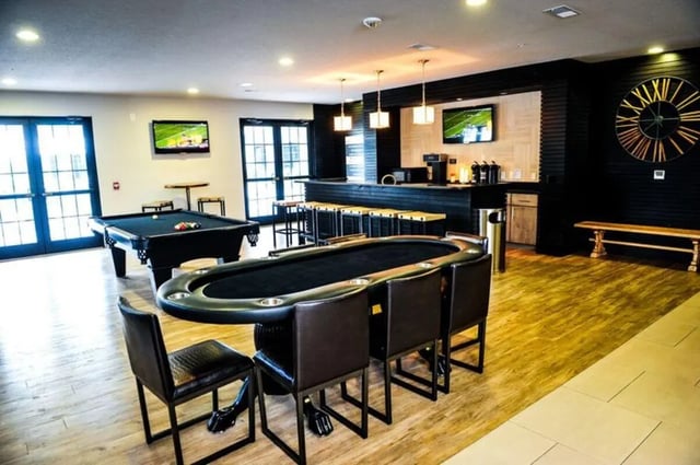 Pool table poker table bar with stools gaming room at The Flats at 4200 in Tampa Student Accommodation