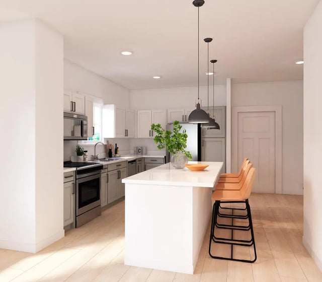 Kitchen with island stools appliances and cabinets kitchen at Aspen Tampa in Tampa Student Accommodation