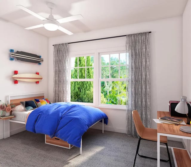 Bed desk skateboards and window bedroom at Aspen Tampa in Tampa Student Accommodation