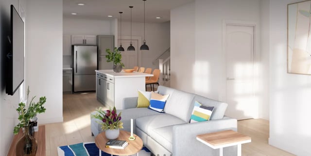 Sofa kitchen island television and painting living room at Aspen Tampa in Tampa Student Accommodation