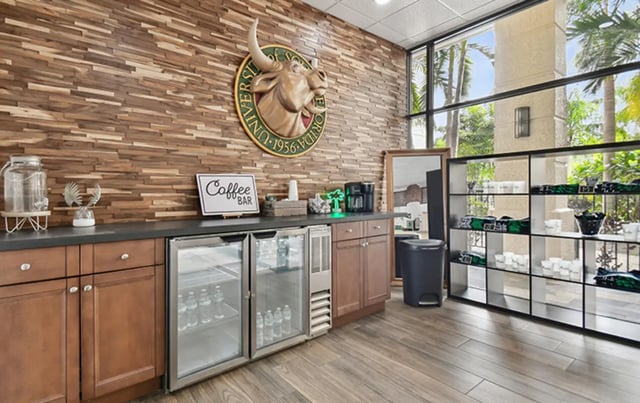 Coffee bar with mini fridges and shelves common area at Malibu Apartments in Tampa Student Accommodation