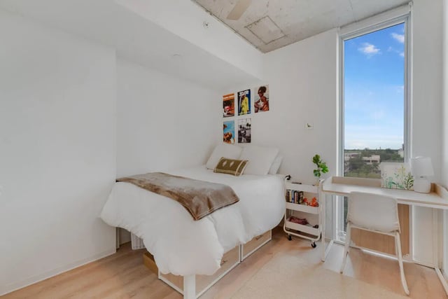 Bed desk and cart bedroom study area at VOX Miami in Miami Student Accommodation