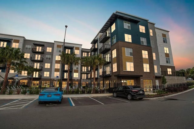 Modern apartments with balconies and parking exterior at RISE 34 in Gainesville Student Accommodation