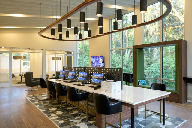 Computers printers and desks computer lab at The Metropolitan Gainesville in Gainesville Student Accommodation