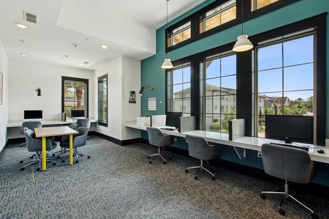 Computers desks and chairs computer lab at The Station Alafaya in Orlando Student Accommodation