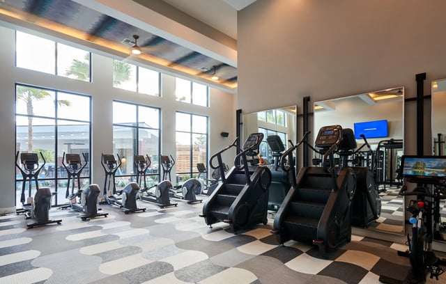 Elliptical machines and stair climbers gym at The Accolade Collegiate Village West in Orlando Student Accommodation