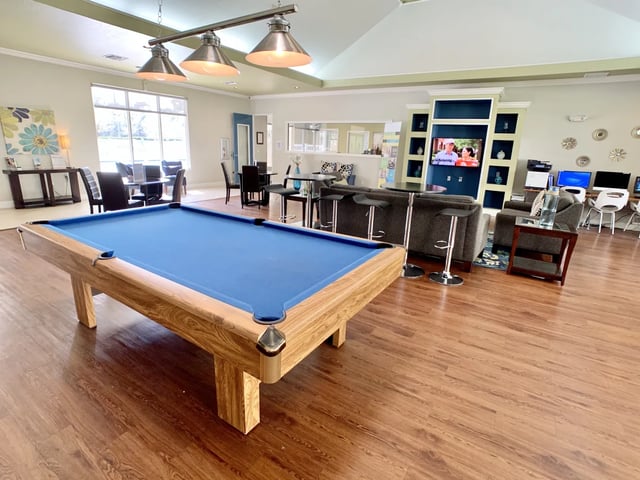 Pool table seating and computers game room at Tivoli Orlando in Orlando Student Accommodation