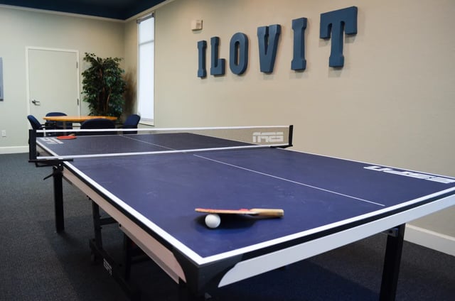 Ping pong table with paddles and ball playing area at Tivoli Orlando in Orlando Student Accommodation