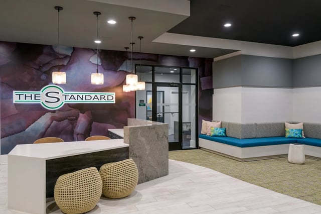 Modern reception desk with seating area Lobby at The Standard at Coral Gables in Miami Student Accommodation