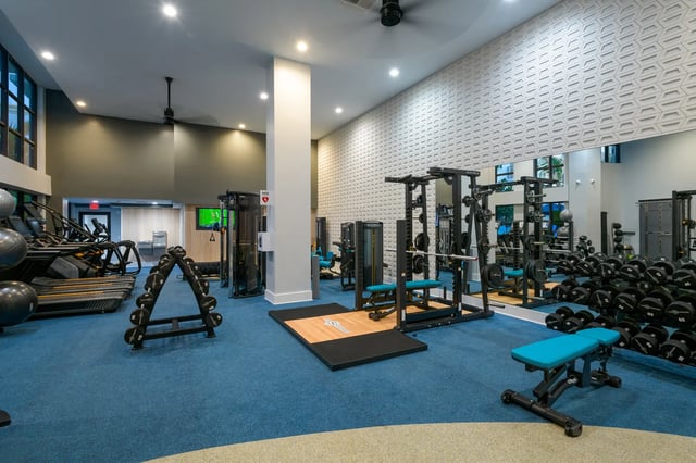 Gym with treadmills weight racks and benches Gym at The Standard at Coral Gables in Miami Student Accommodation