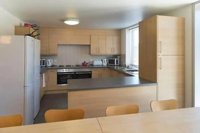 Kitchen with refrigerator stove cabinets and counter kitchen at Denton Holme in Carlisle Student Accommodation