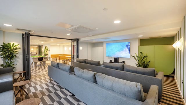 Sofas television pool table visible common area at The Edge in Belfast Student Accommodation