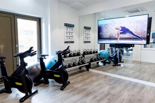 Exercise bikes kettlebells yoga screen gym at Bankside Student Living - Guildford in Guildford Student Accommodation