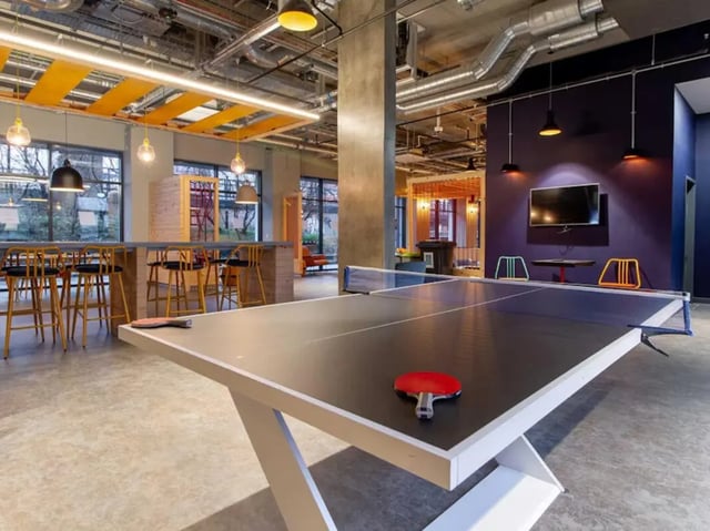 Ping pong table and bar stools common area. at Hythe Mills in Colchester Student Accommodation