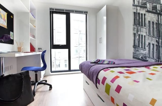 Bed desk chair window wardrobe bedroom at Gateway Apartments in Edinburgh Student Accommodation