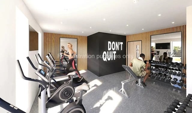 Treadmills weight bench dumbbells gym equipment fitness area at Waterloo House in York Student Accommodation