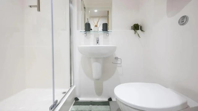 Shower sink and toilet in modern bathroom at Raffles Hall in York Student Accommodation