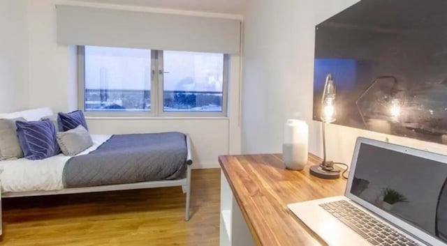 Bed desk with laptop and lamp bedroom at The Glasshouse in Nottingham Student Accommodation