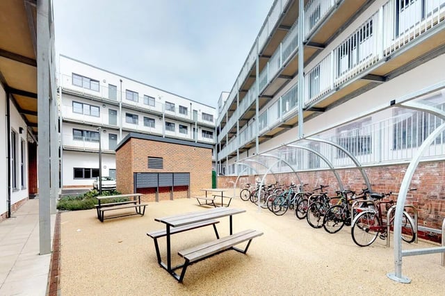Bicycles picnic tables and building exterior at Stepney Yard in Newcastle Upon Tyne Student Accommodation