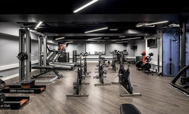 Treadmills exercise bikes and weight machines gym at Collegiate Plummer House in Newcastle Upon Tyne Student Accommodation