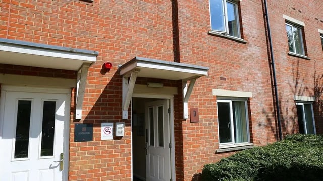 Brick building with doors and windows exterior at Collegiate Upper Quay House in Gloucester Student Accommodation