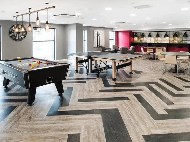 Pool table ping pong tables seating dining area Game Room at Yugo Beckley Point in Plymouth Student Accommodation