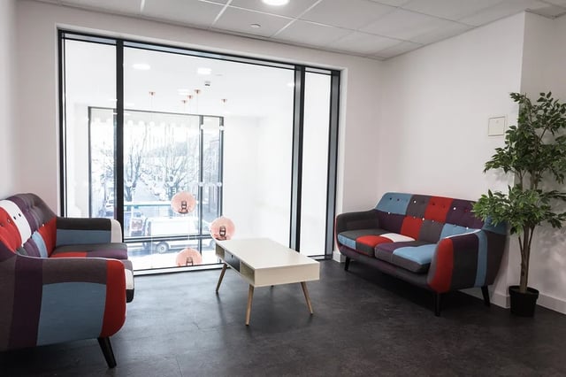 Patchwork sofas coffee table plant lounge living room at City Heights - Cardiff in Cardiff Student Accommodation