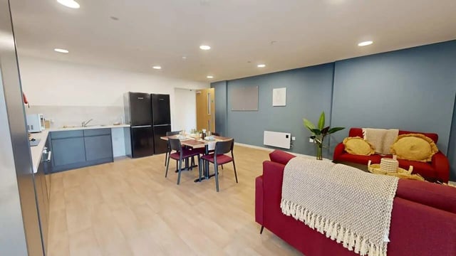 Kitchen dining area with sofas living room at Enso in Colchester Student Accommodation