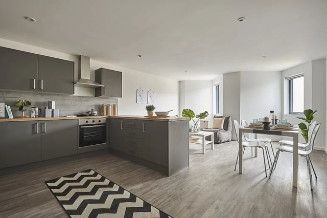 Modern kitchen with island dining and living area at The City Arcade - Exeter in Exeter Student Accommodation