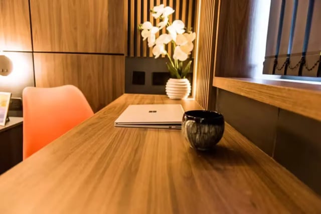 Desk with laptop orchid and chair study area at The Gateway Leicester in Leicester Student Accommodation