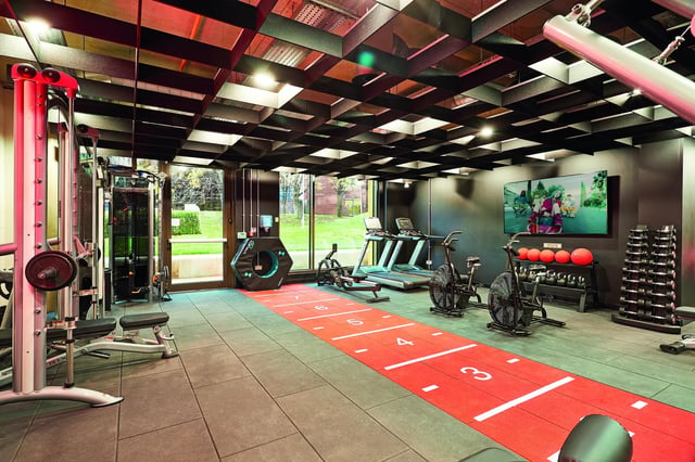Gym equipment treadmills weights fitness area gym at Vita Student St.Albans in Leeds Student Accommodation