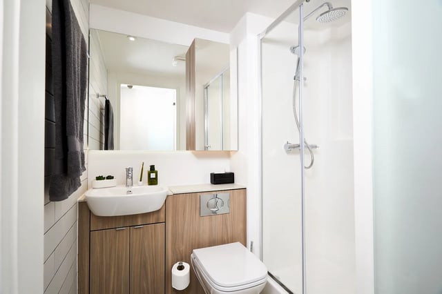 Sink toilet shower and towels bathroom at Vita Student Station Street in Nottingham Student Accommodation