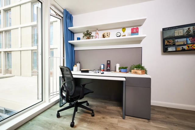 Desk chair shelves TV study area at Vita Student Station Street in Nottingham Student Accommodation