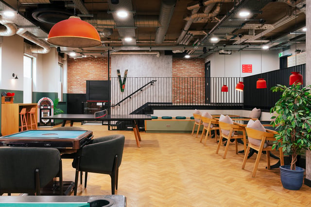 Ping pong table chairs seating area communal area at Vita Student Station Street in Nottingham Student Accommodation