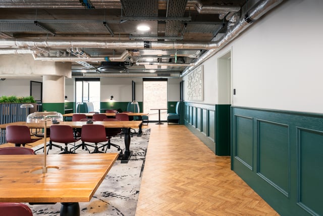 Tables and chairs in communal study area at Vita Student Station Street in Nottingham Student Accommodation