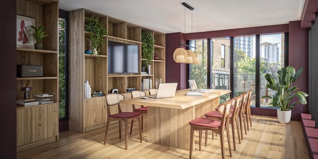 Wooden table with laptops and chairs study area at Canvas Capital House in Southampton Student Accommodation