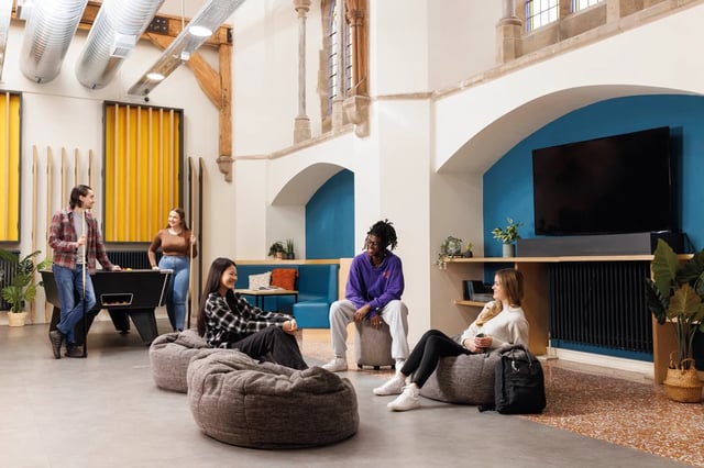 Students by pool table and beanbags common area at St Vincents Place in Sheffield Student Accommodation