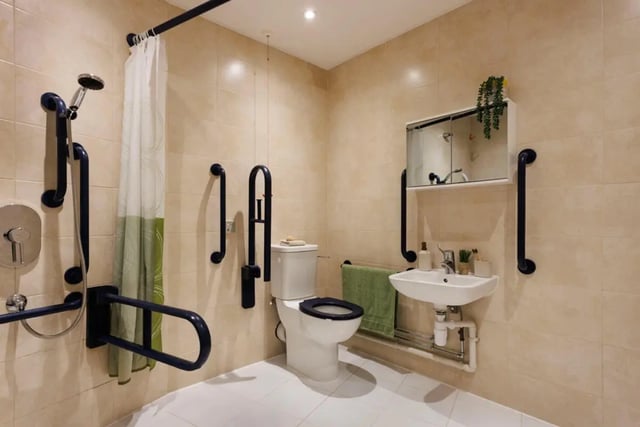 Accessible bathroom with grab bars shower and sink. Bathroom at Quay Point Studios in Newcastle Upon Tyne Student Accommodation