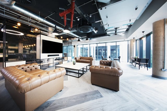 Chesterfield sofas television modern living room area at White Rose View in Leeds Student Accommodation