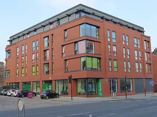 Modern student accommodation building with large windows exterior at Chapel Street in Salford Student Accommodation