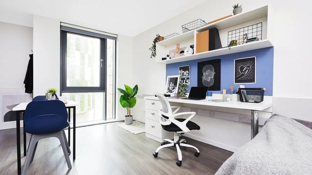 Desk with laptop chair and chairs study area at Granary Studios in Chester Student Accommodation
