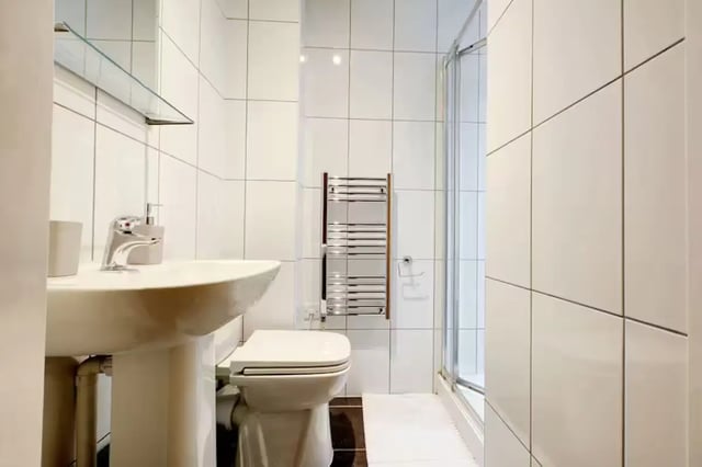 Sink toilet towel rail shower bathroom at Brookland Road in Leicester Student Accommodation