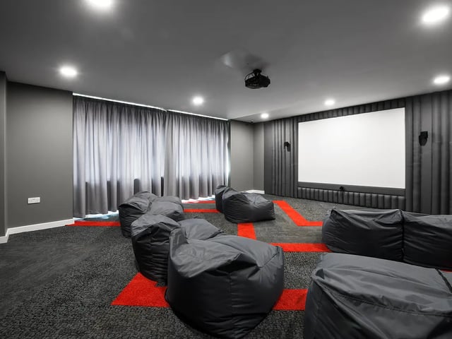 Beanbags facing cinema screen playing area at Yugo Austen House in Southampton Student Accommodation